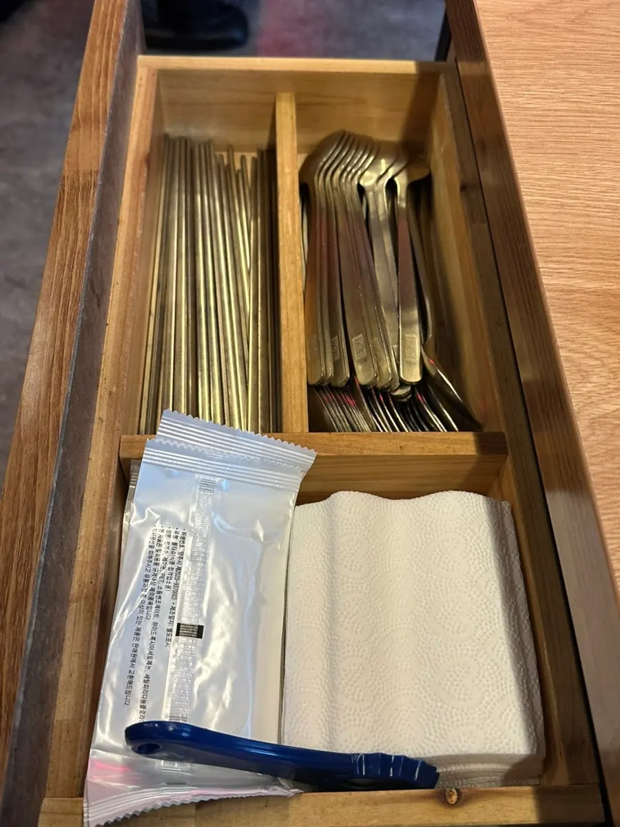 Sesame oil, salt, and pepper set on the table