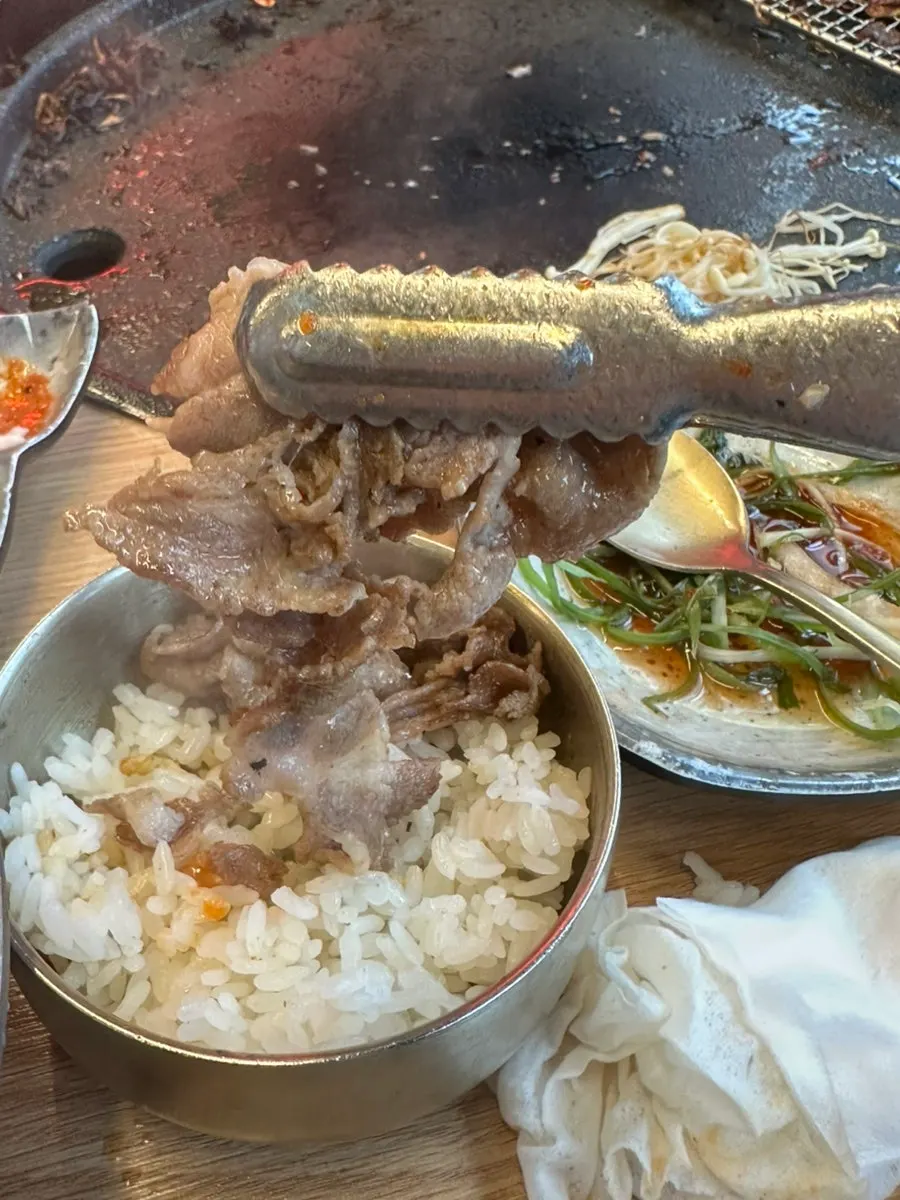 Cold noodle soup eaten alongside the meat