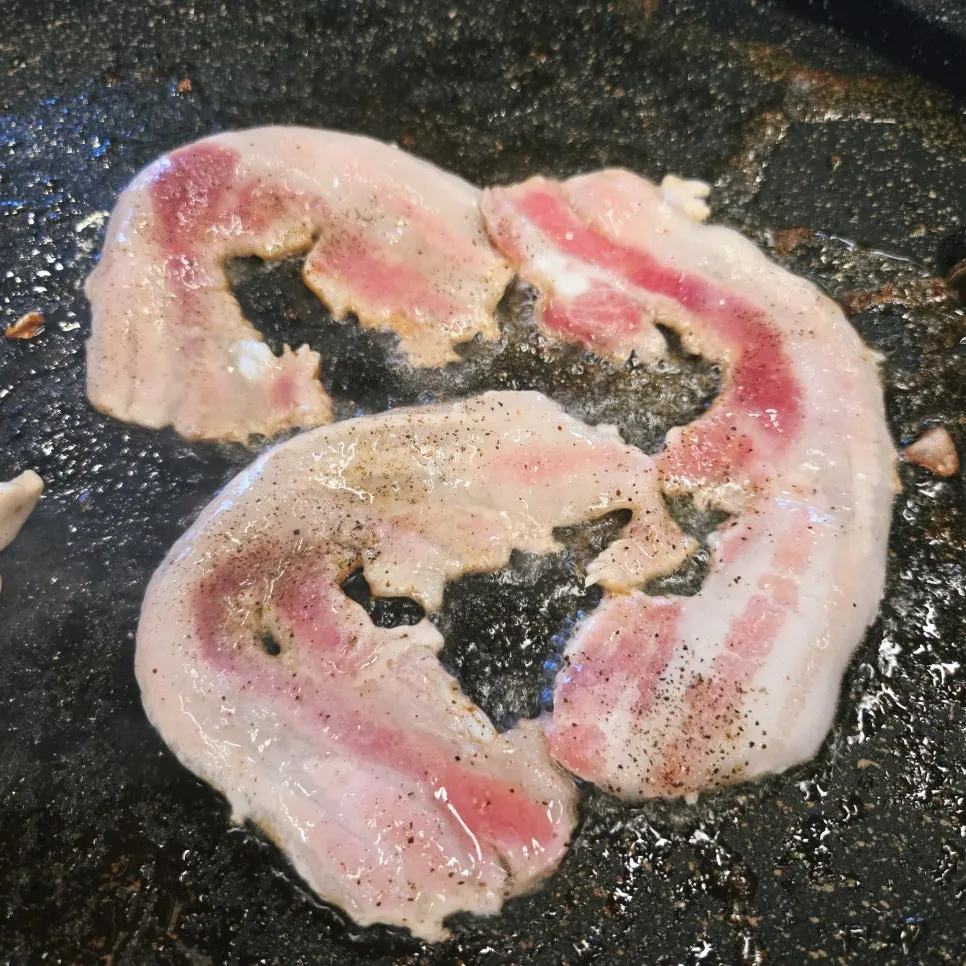 Pepper sprinkled over the grilled meat