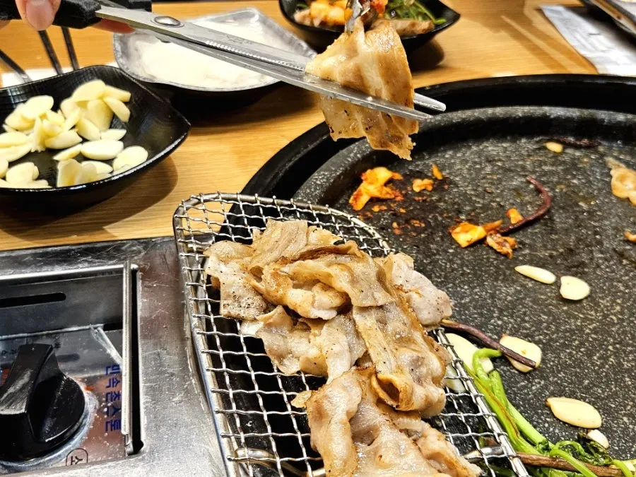 Grilled pork belly paired with grilled kimchi