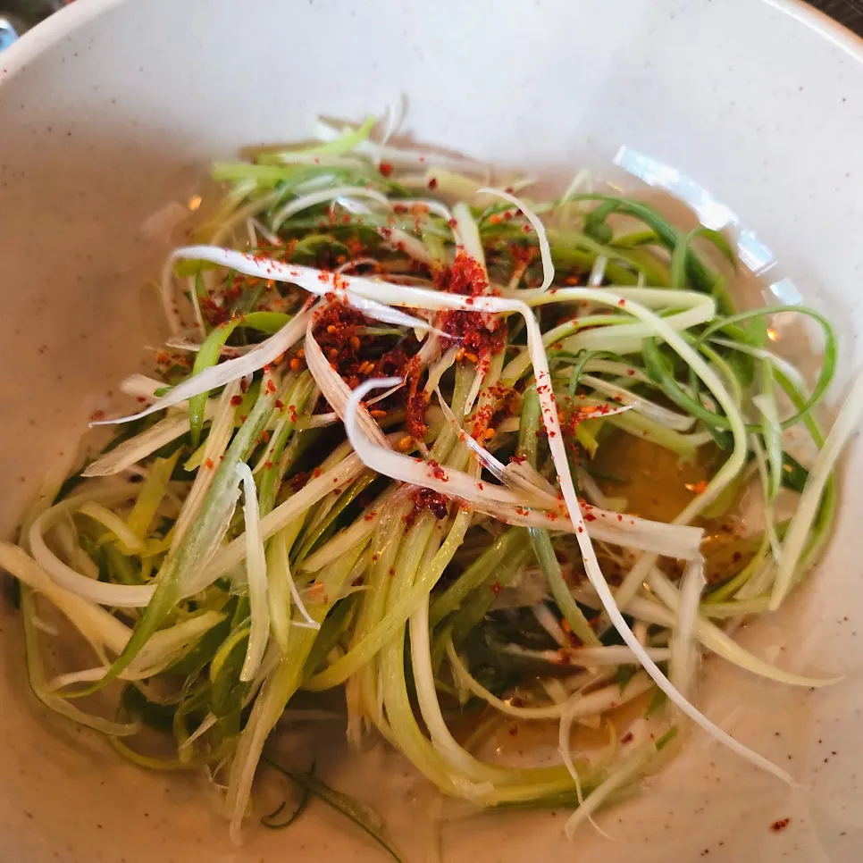A plate of fresh vegetables served alongside the meal