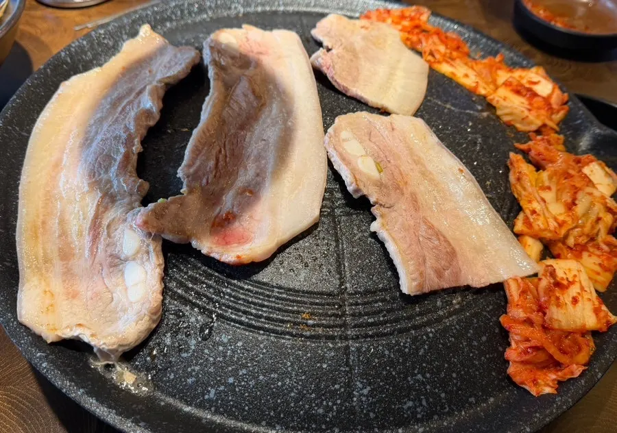 Close-up of golden-grilled pork belly