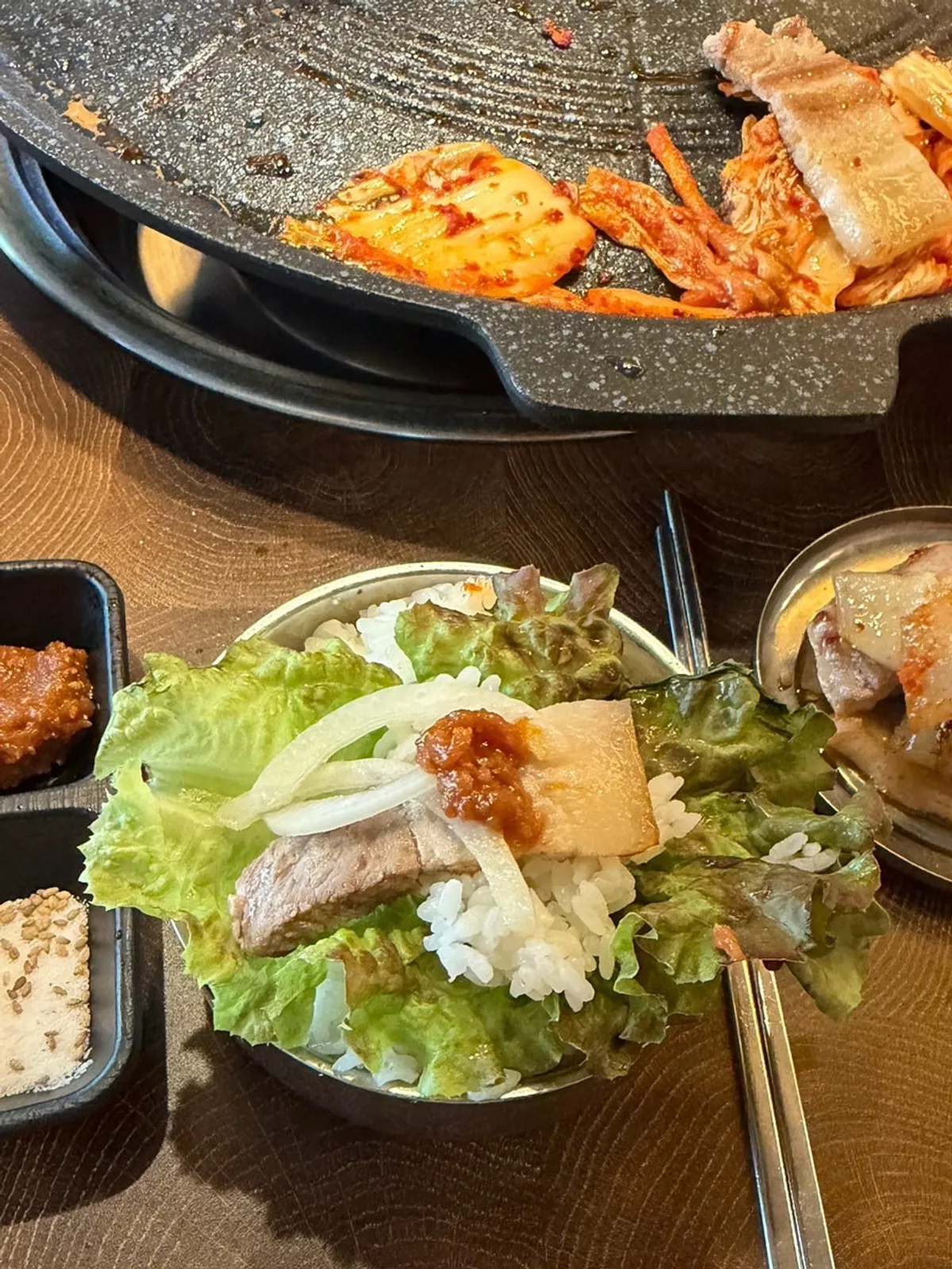 Grilled pork belly served on top of rice