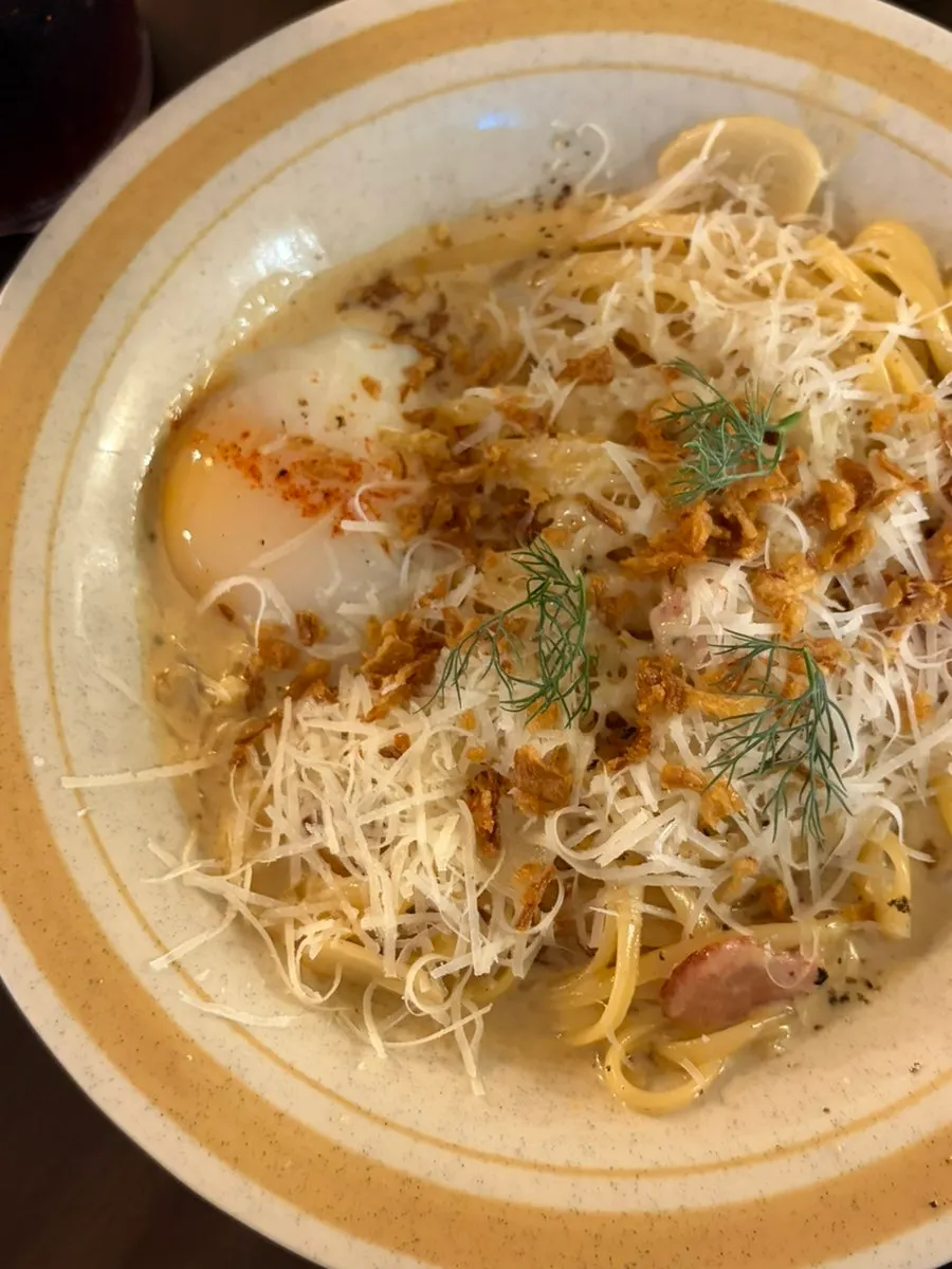 Ordered carbonara and rosé risotto dishes