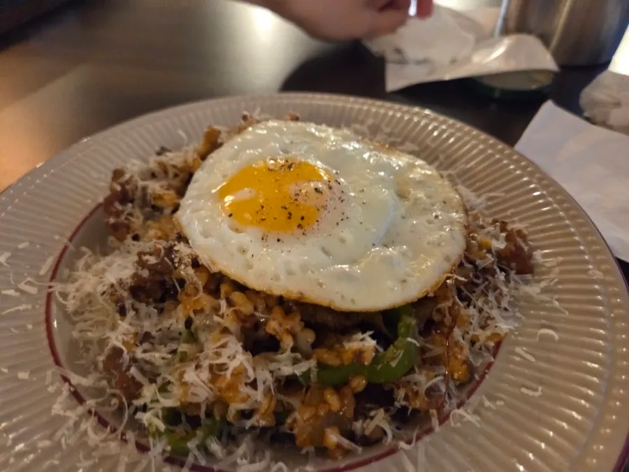 Close-up of pilaf topped with beef brisket