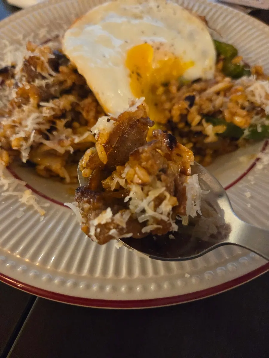 Beef brisket pilaf and pasta placed together on the table