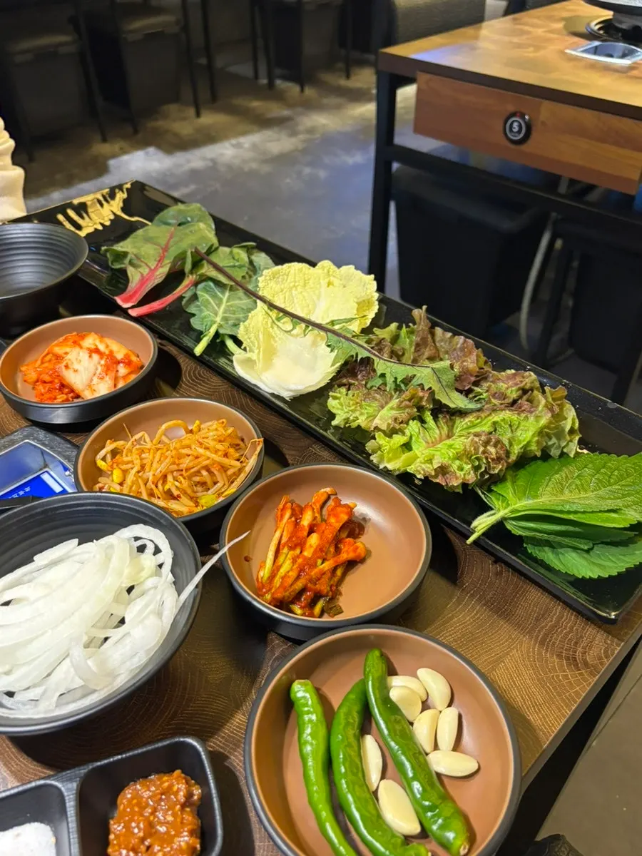 Assorted wrap greens including chicory and cabbage