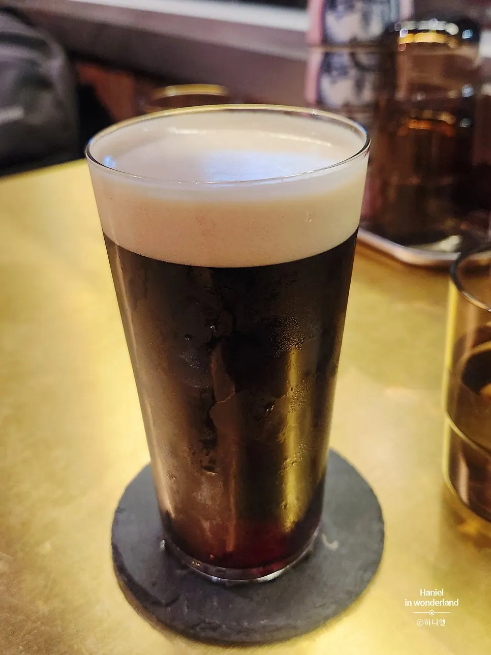 A glass of Asahi black beer