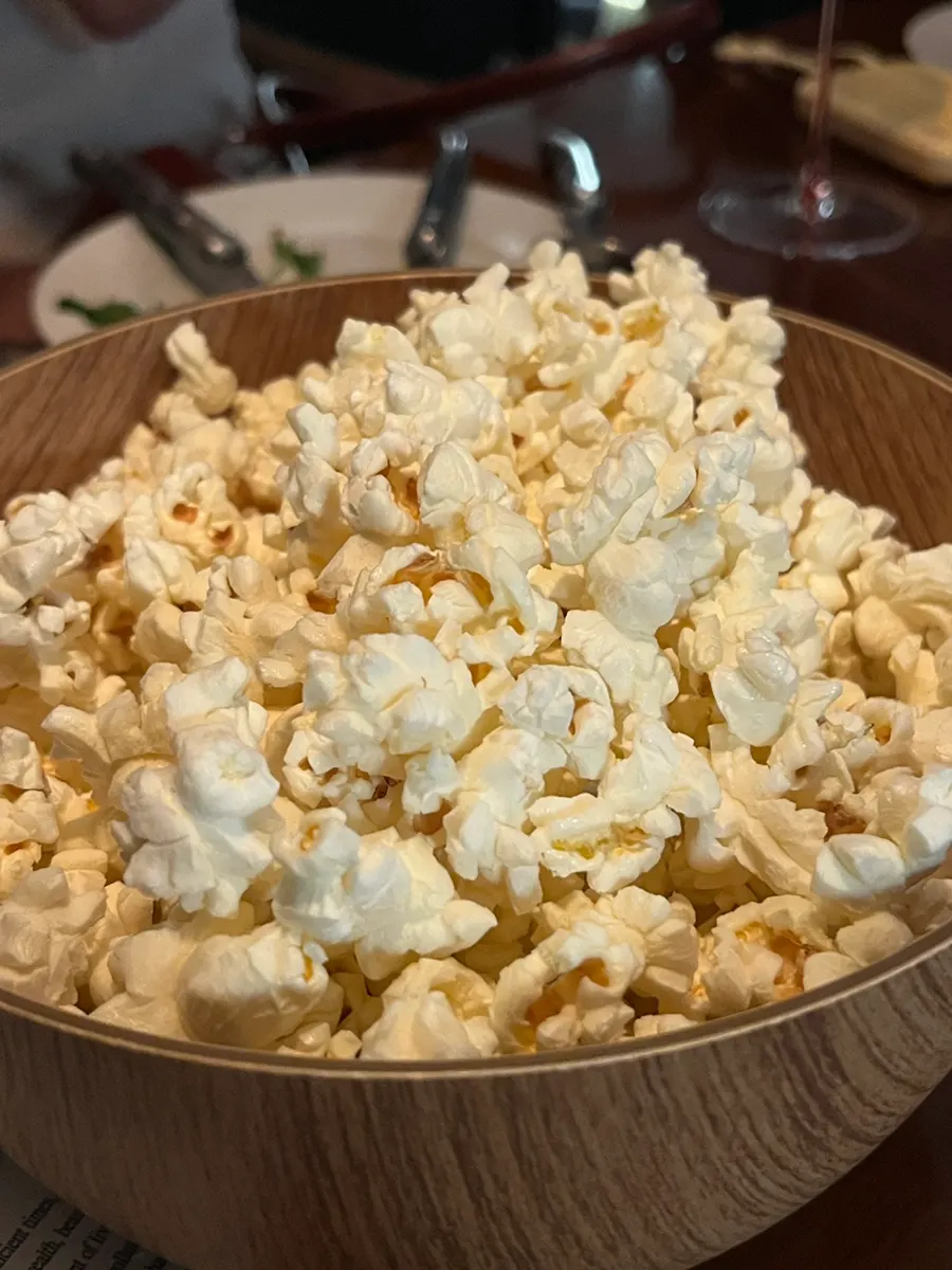 Freshly fried popcorn served on the house