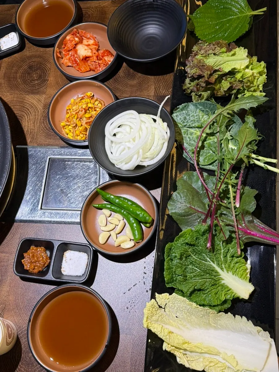 A large plate piled high with wrap vegetables
