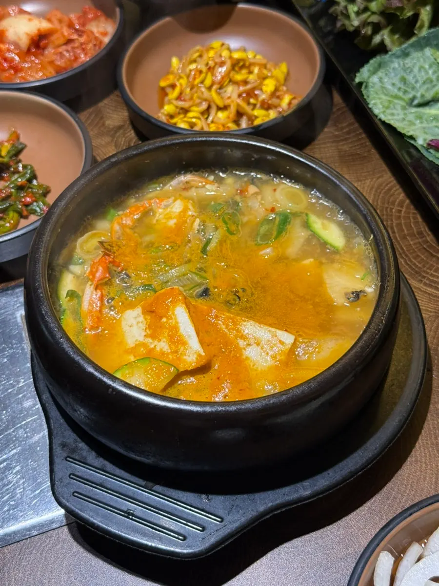 Stone pot of abalone-seafood doenjang stew served with the meat order