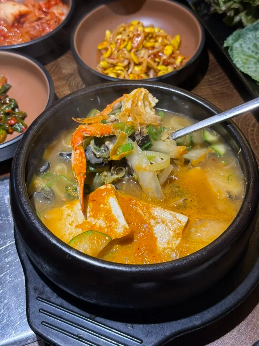 Seafood doenjang stew with abalone snails and blue crab