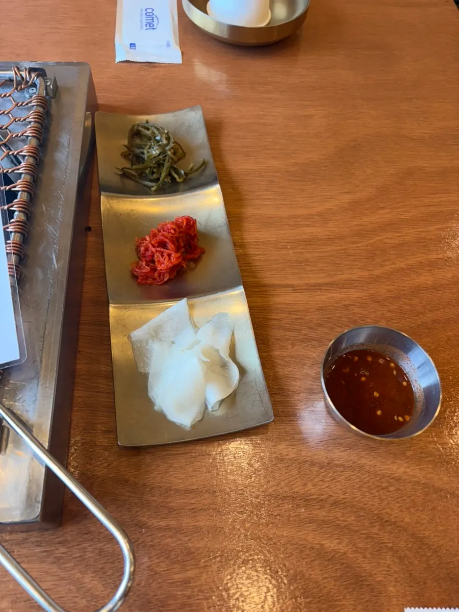 Lettuce salad, salted seafood, radish wraps and other side dishes
