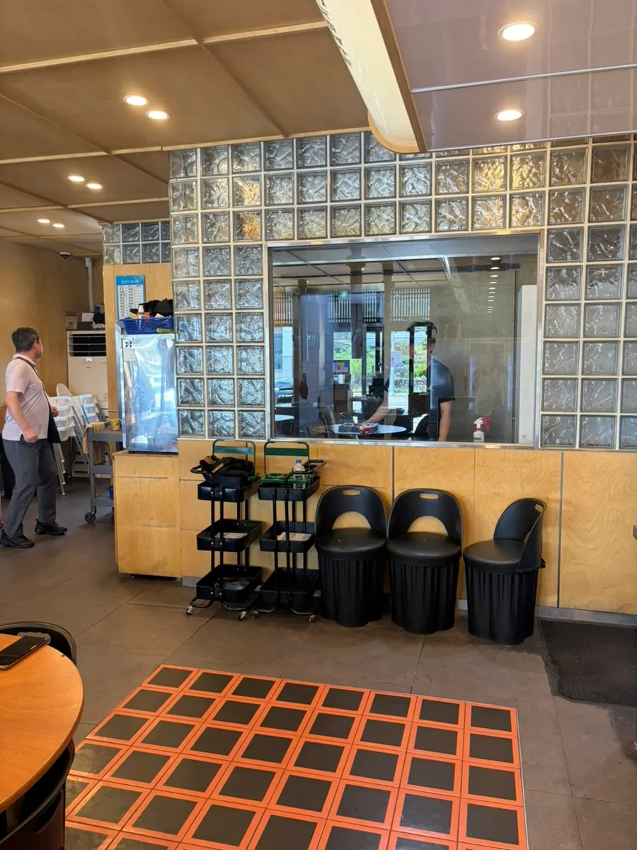 The area inside the restaurant where the meat is pre-seared