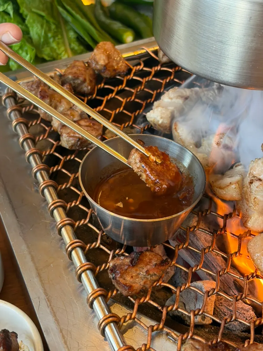 Golden-grilled black pork with a dab of wasabi