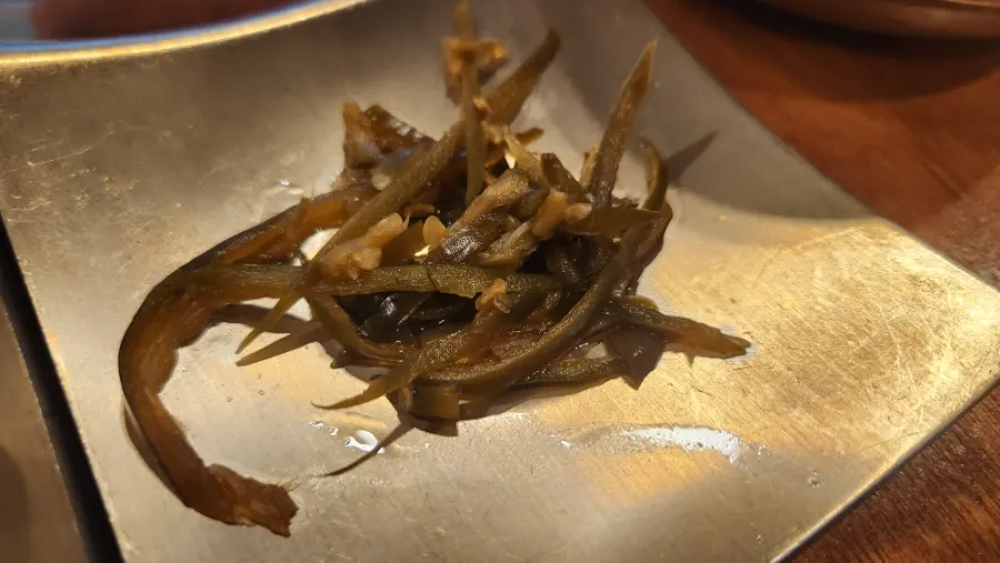 Side dish plate served with black pork