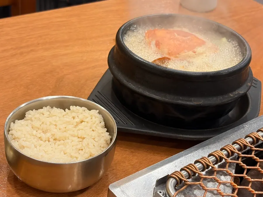Doenjang jjigae served boiling in a stone pot
