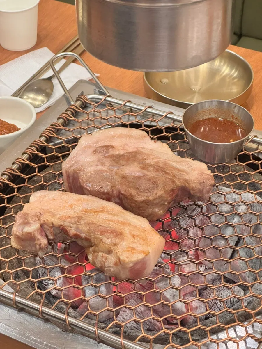 Black pork geun-gogi placed on the charcoal grill