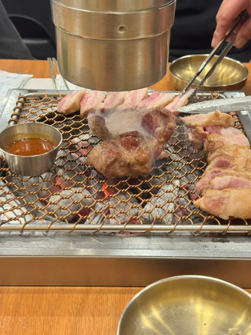 Staff performing the grilling service