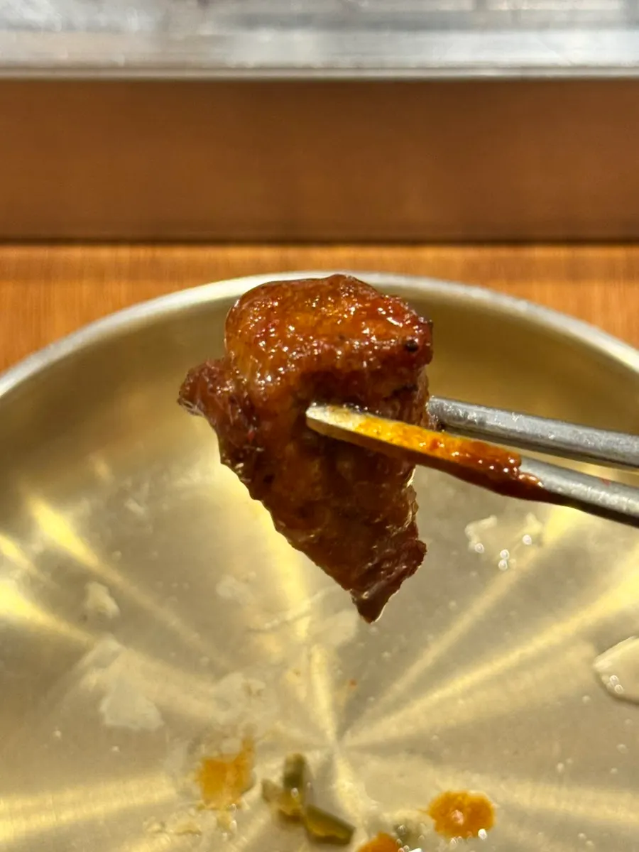 Black pork dipped in melljeot sauce