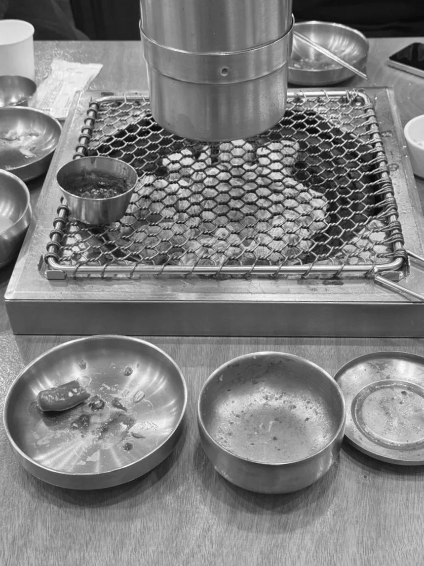 Empty bowls of finished kimchi jjigae and kelp rice