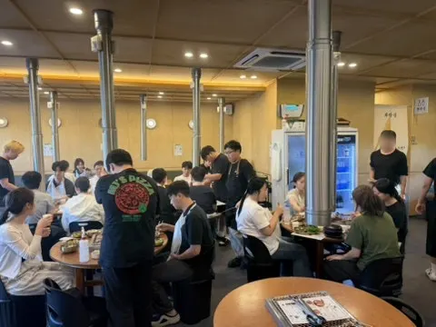 Dining hall at Nopo Dwaeji Aewol packed with diners in the evening