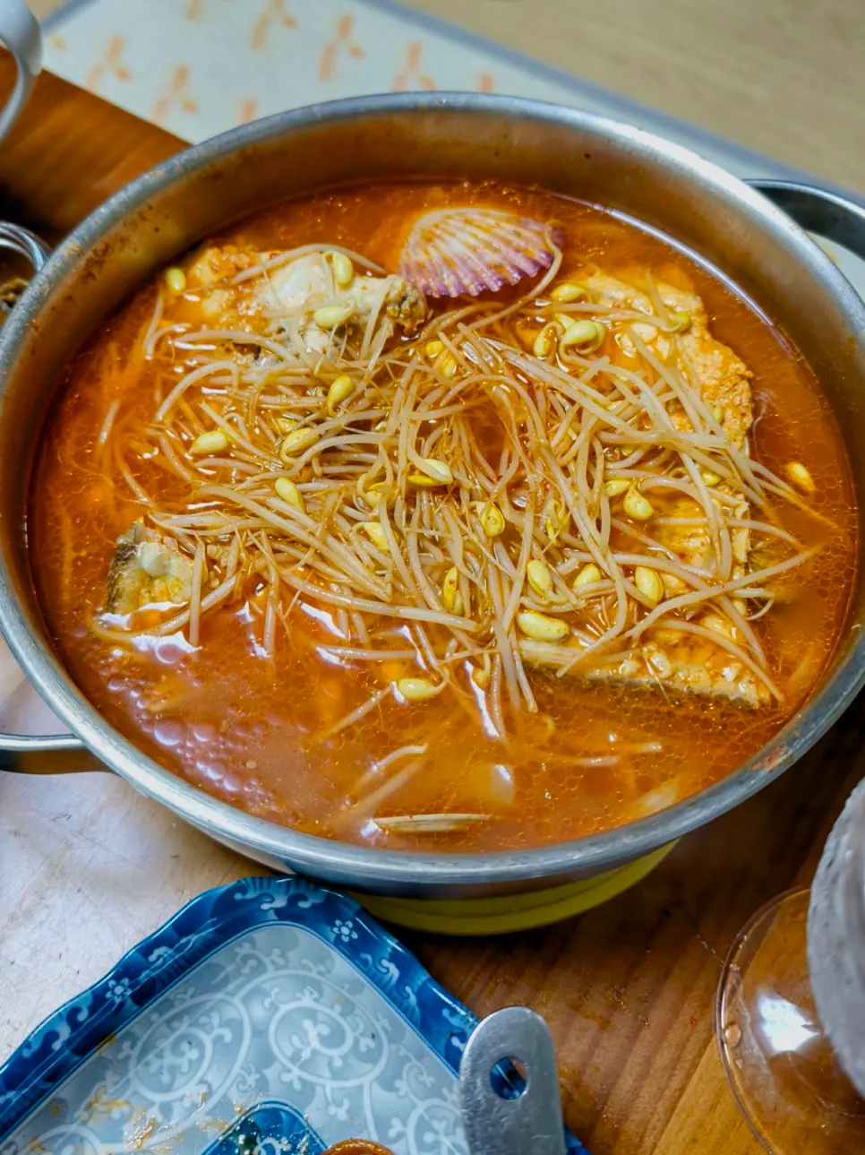 Fish stew ingredients and sauce packed along with the order