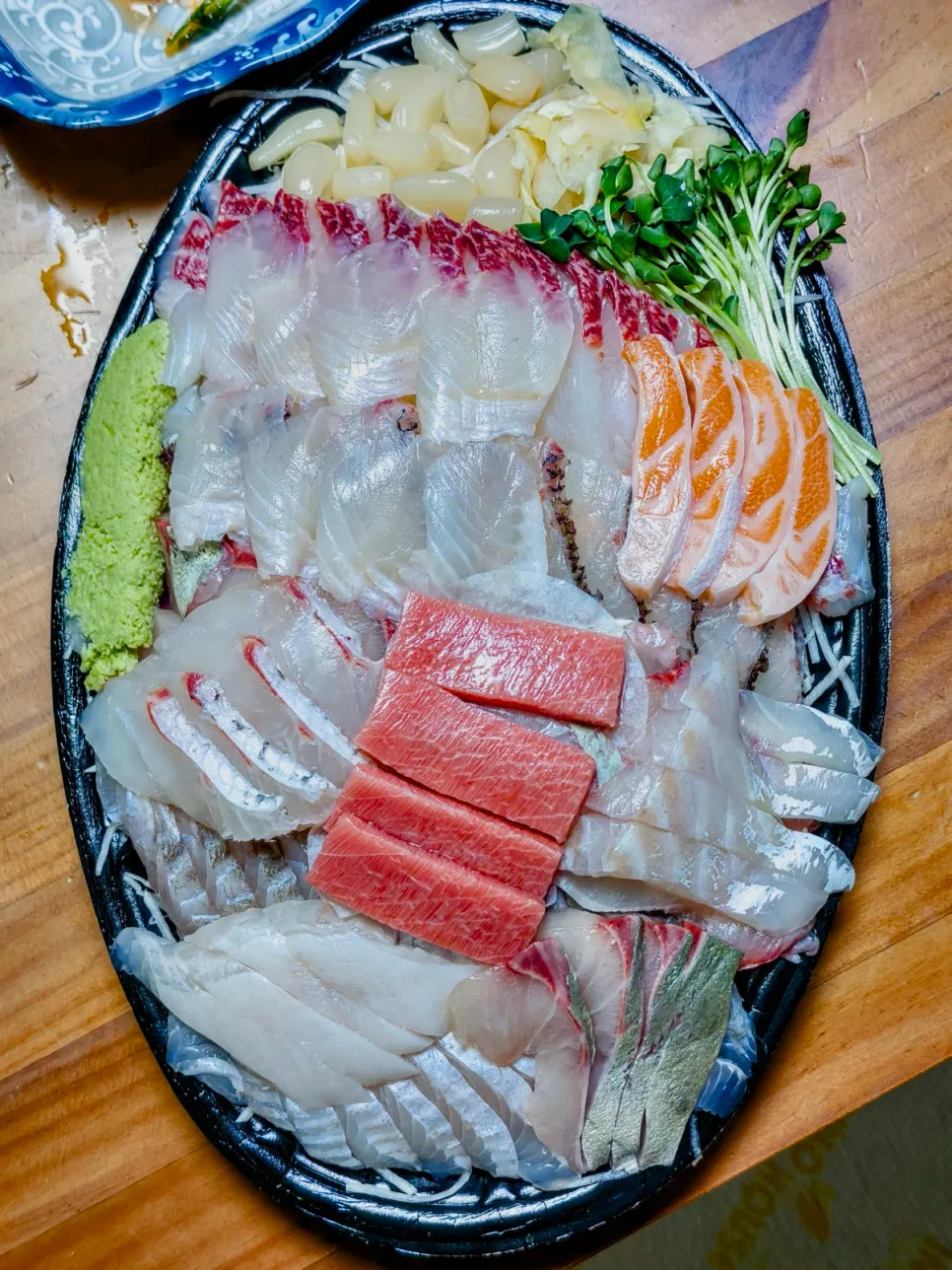 Table setting after finishing the Ttangkkeut Maeul sashimi meal