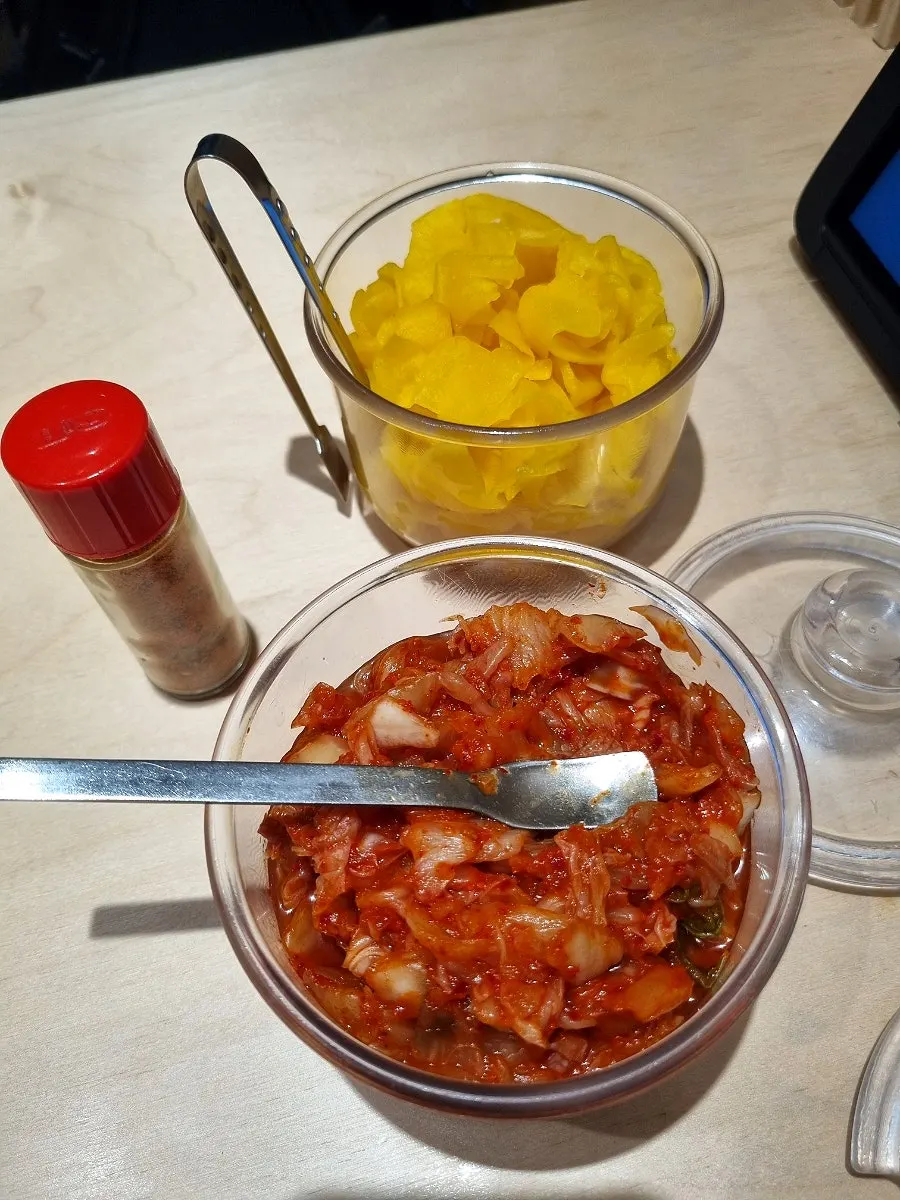 Basic banchan of pickled radish and kimchi
