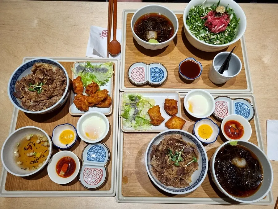 The gyudon set and yukhoe-don set served first