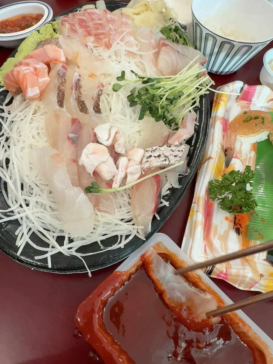 Generous sashimi and complimentary shrimp