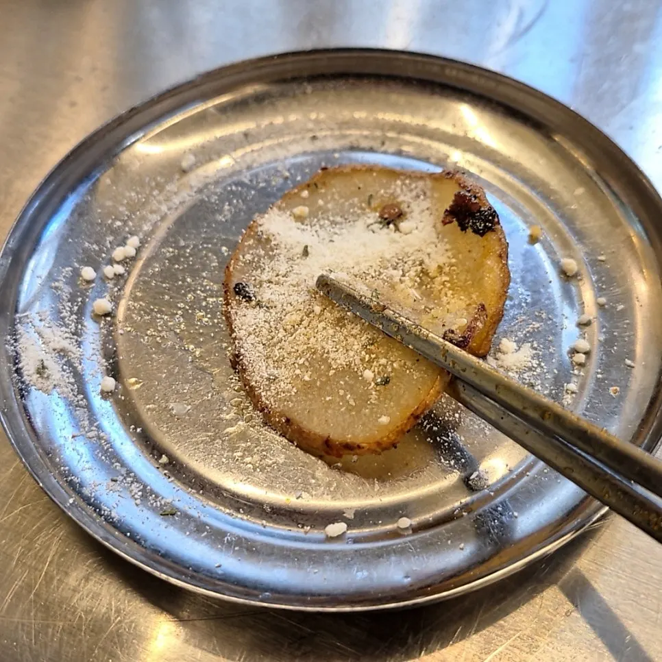 Grilled potato sprinkled with honey butter seasoning