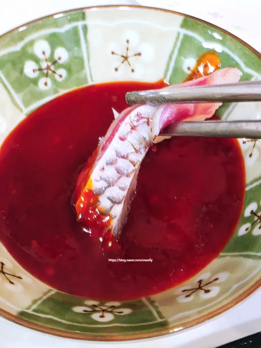 A slice of assorted sashimi with radish sprouts