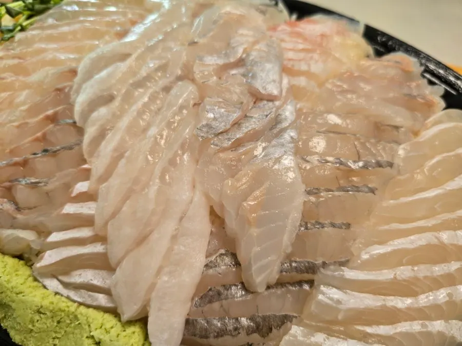 Ttangkkeut Maeul mixed sashimi takeaway at Noryangjin Fish Market
