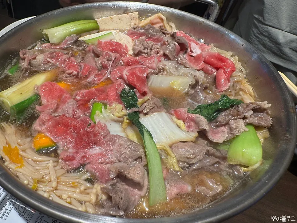 Sukiyaki pot starting to boil at Chome
