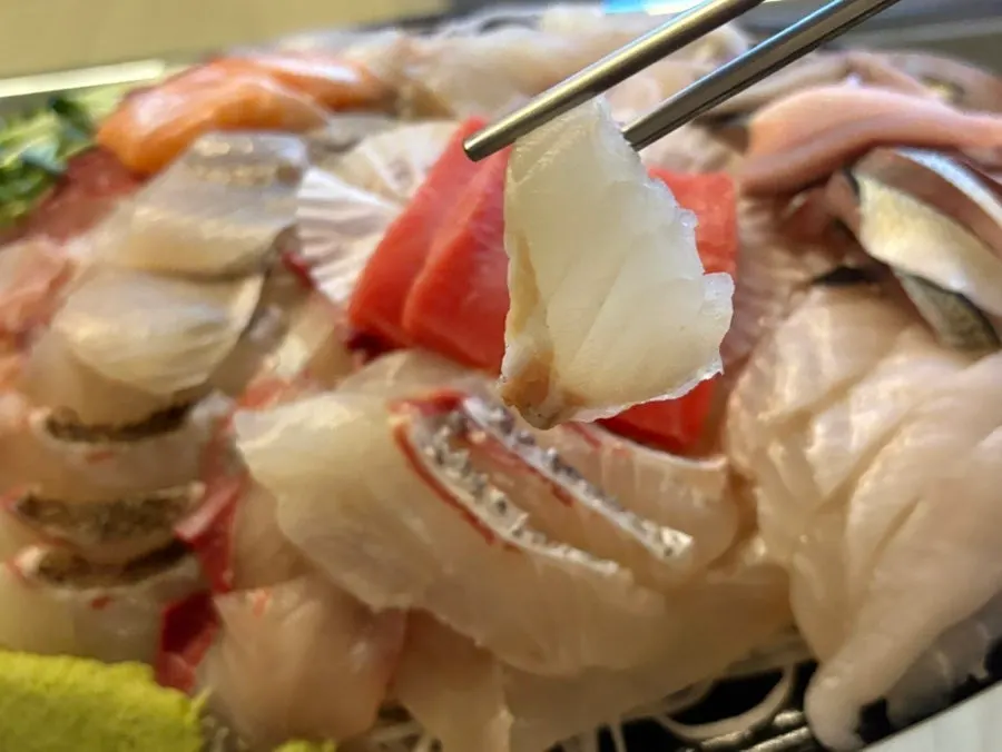 Close-up of pale pink, firm sashimi