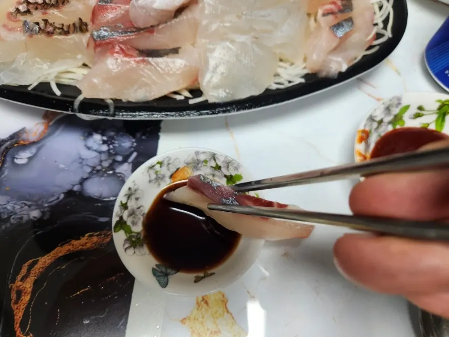 Close-up of thickly sliced red seabream sashimi