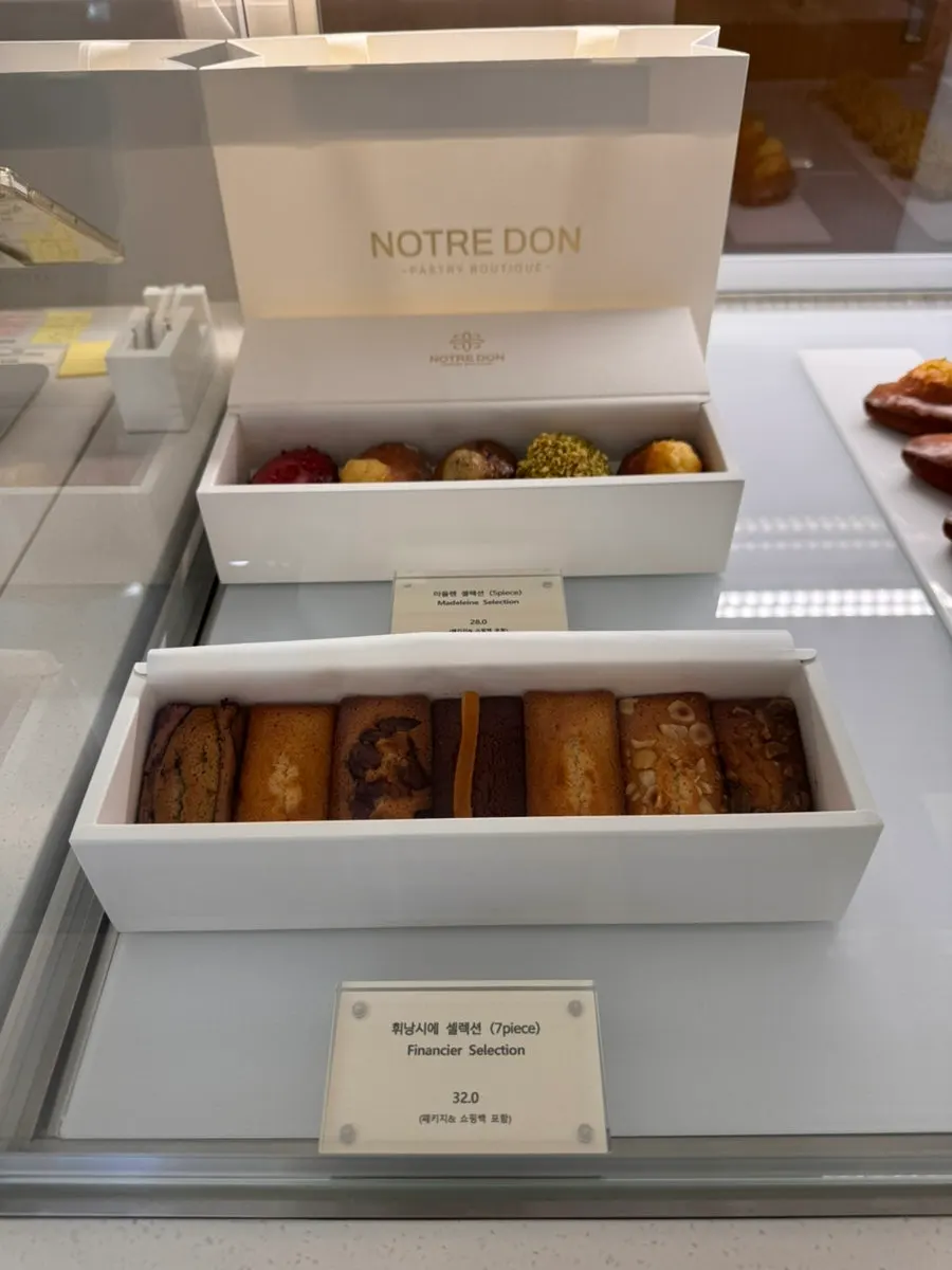 Boutique display filled with a variety of desserts