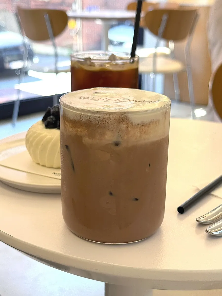Close-up of the deep cacao-colored chocolate latte
