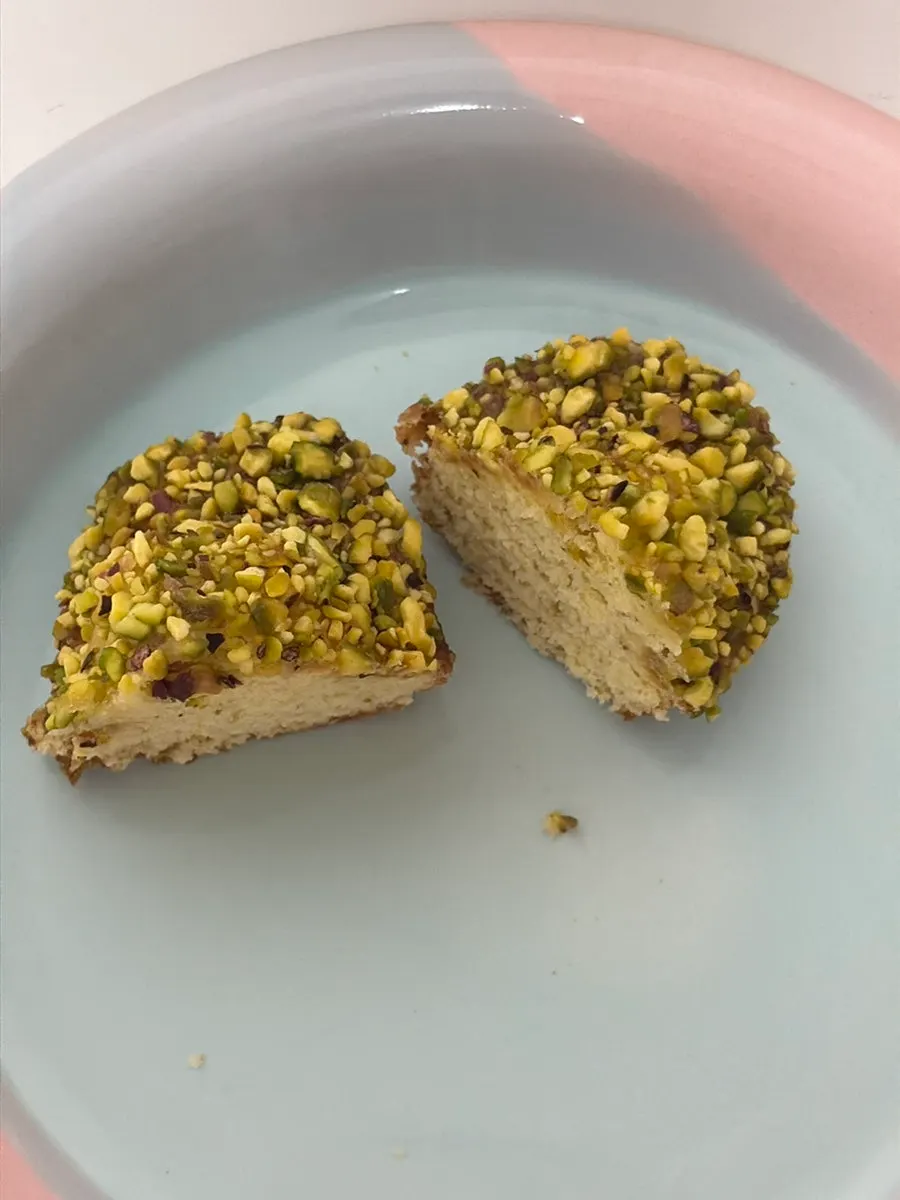 Notldun madeleine topped with pistachio