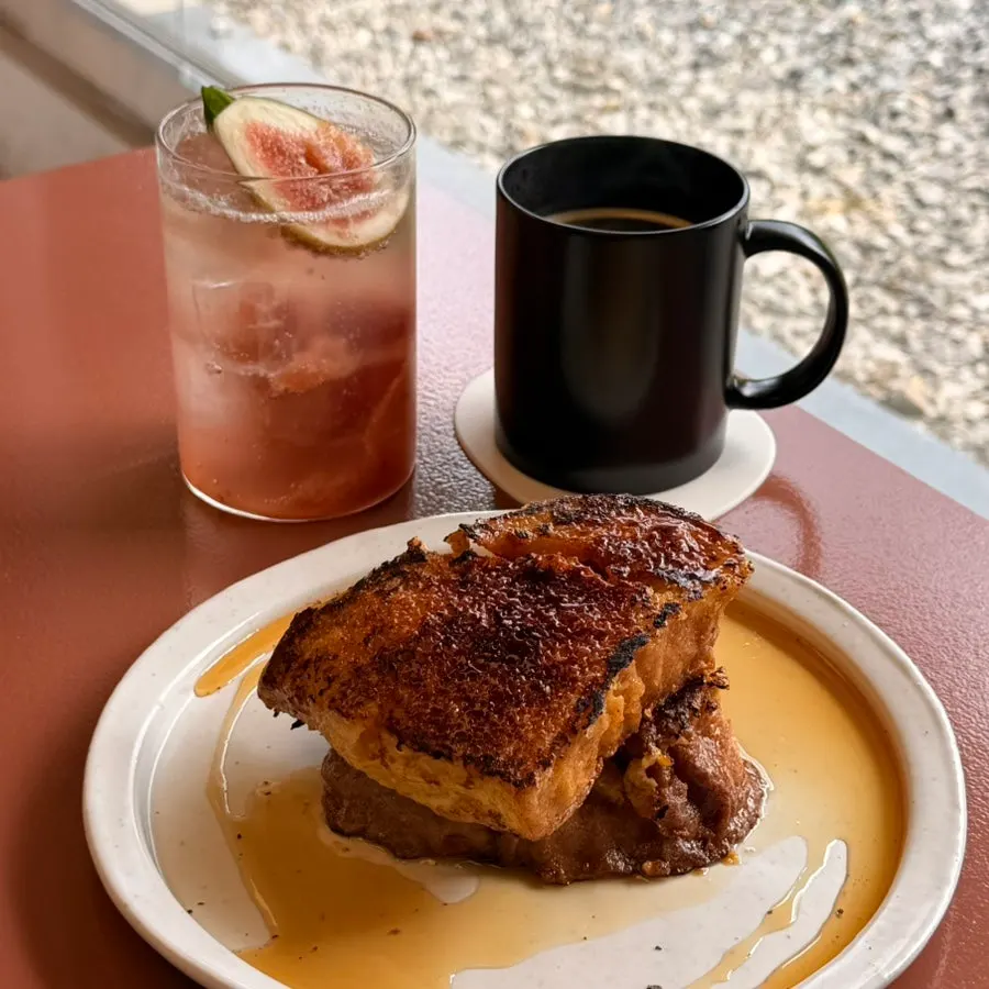 Table setting with French toast and drinks