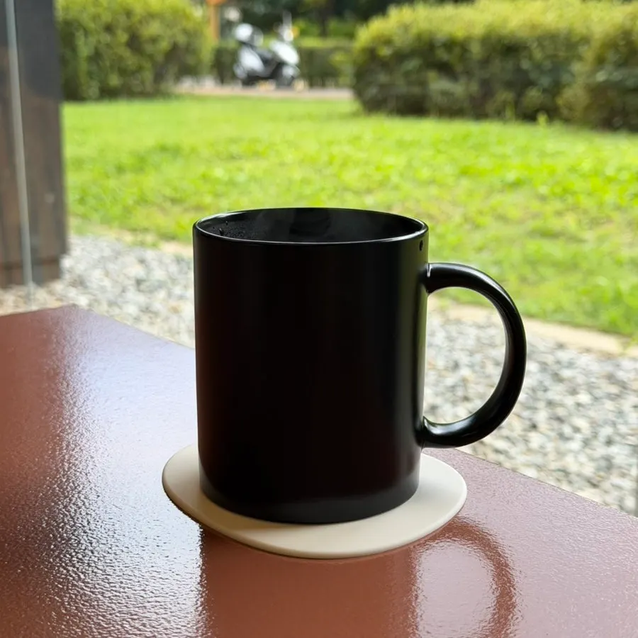 Hot americano brewed with sour Momos Coffee beans