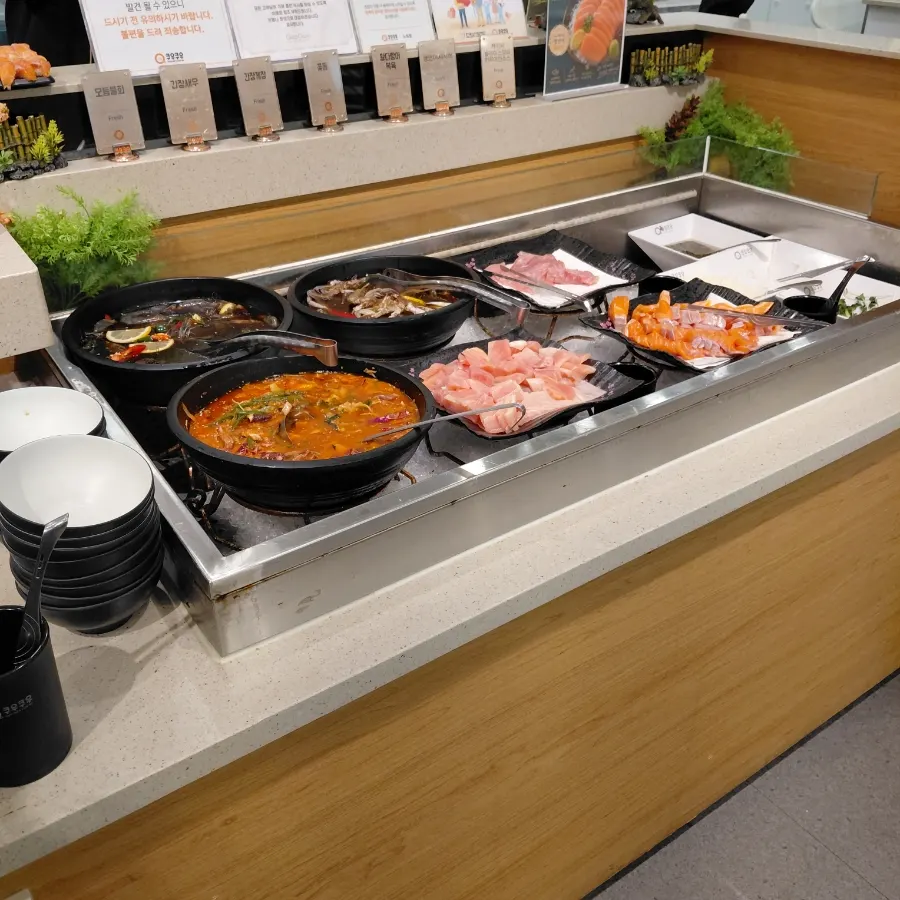 A variety of sushi and dishes on a plate