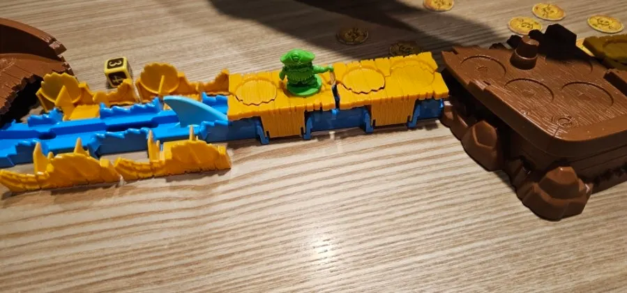 Screen showing a board game how-to video