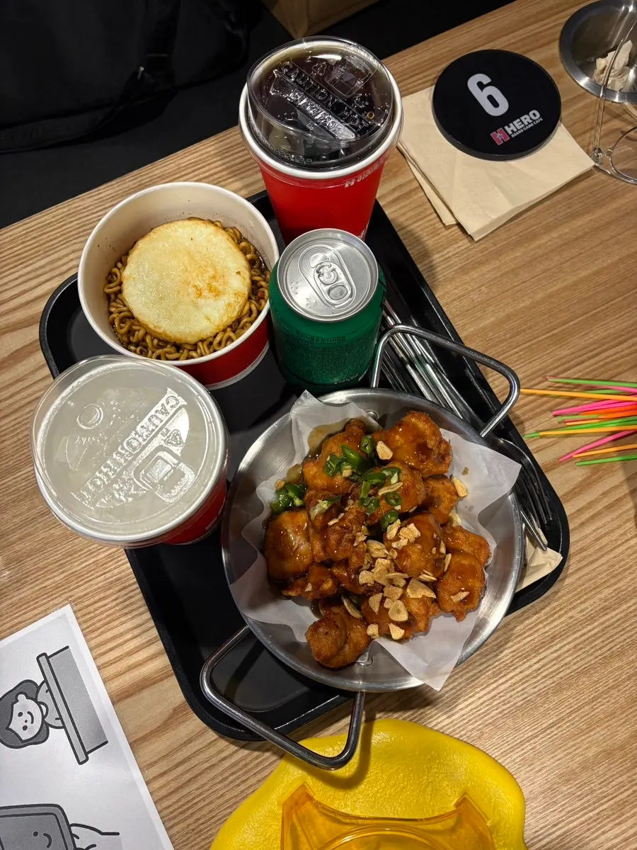 Snacks ordered at the board game café laid out on the table