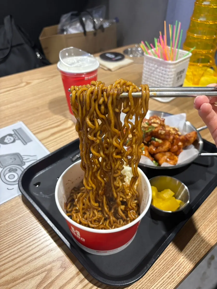 Jjapaguri mixed together with the sauces
