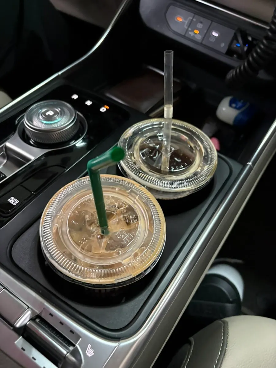 Two takeaway coffee drinks