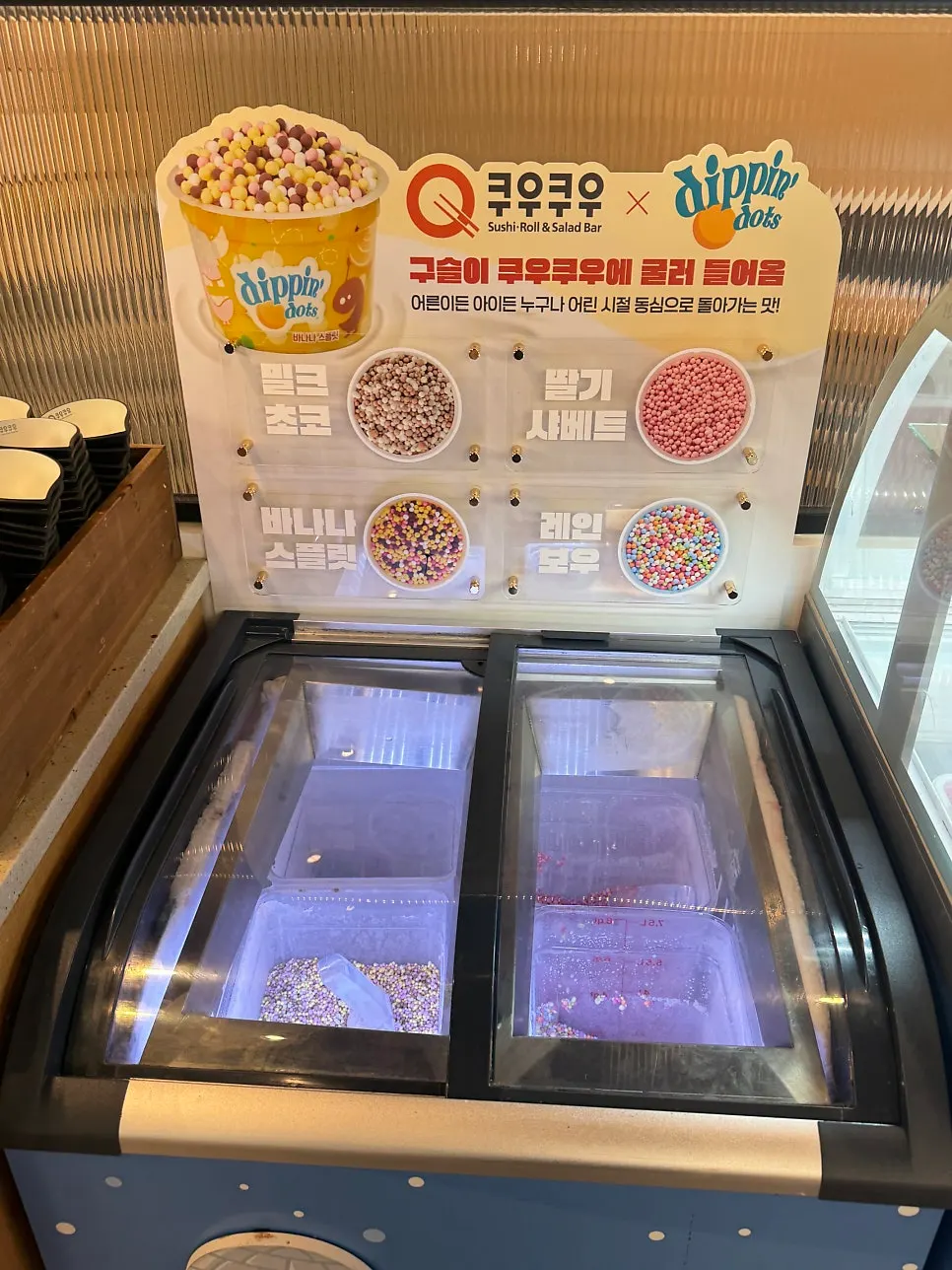Waffles and drinks displayed at the dessert corner