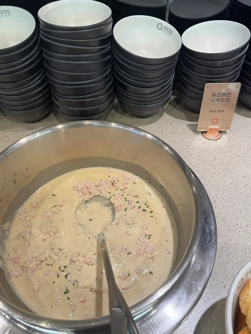 Signage introducing new menu items like Uljin snow crab soup