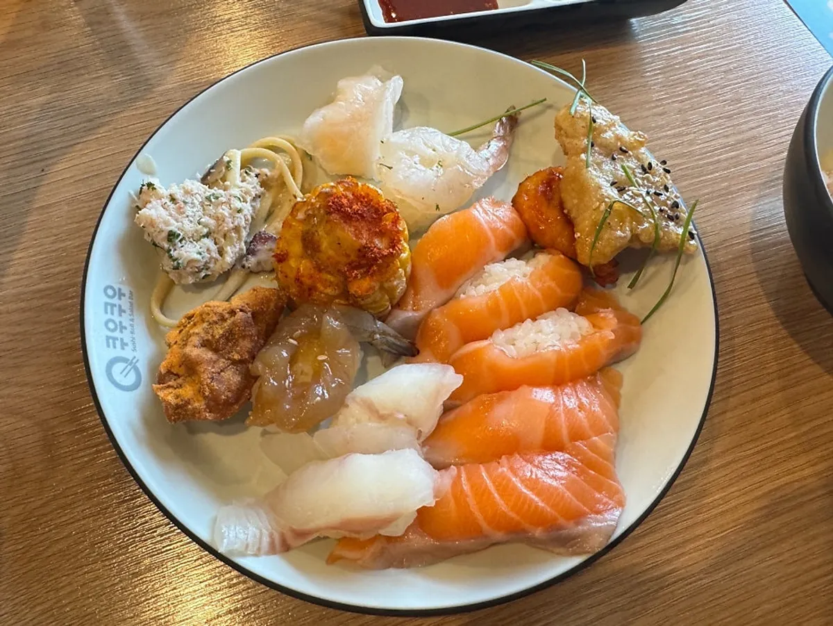 A family meal spread on the table at Kuu Kuu Nowon Branch